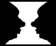 Optical illusion of two face profiles with white space between. Looks like either a white vase or two faces.